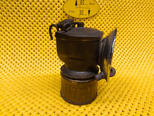 Antica lampada da minatore