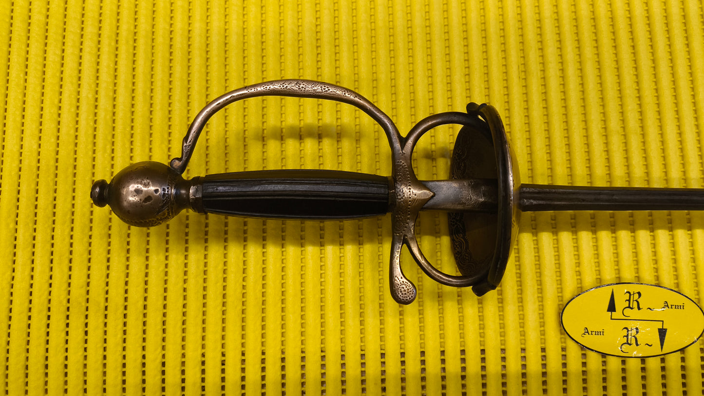 Antico spadino in bronzo del 700